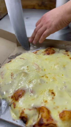 Pizzería Muzza - Las Piedras