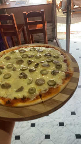 Opinii despre KOSMOS în Col. del Sacramento - Gastronomía y hostelería