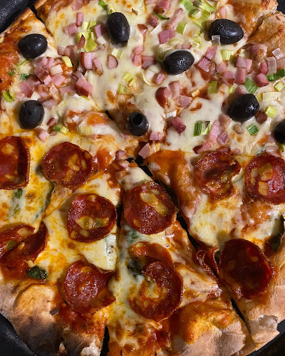 Súarez Arte y Pizzas