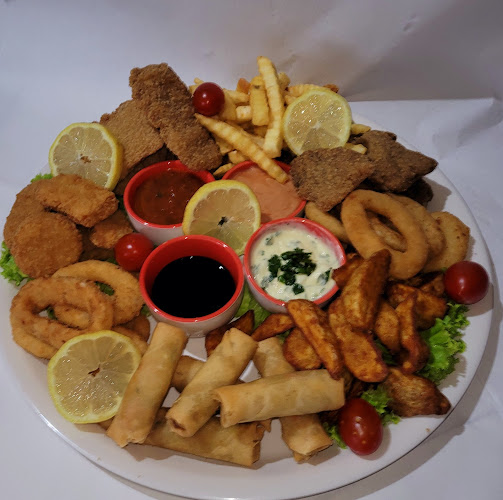 Rotiseria y Pizzería Nuestras Delicias - Atlántida