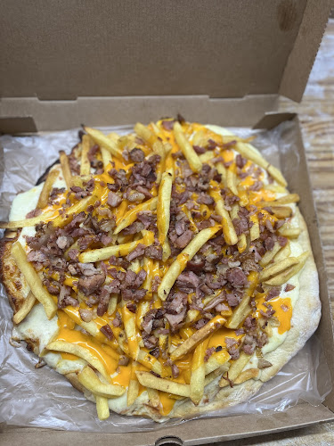 Pizzería Muzza - Gastronomía y hostelería