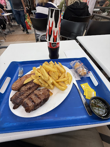 Ellauri 350 local MR1 pza. de comidas shopping pta. carretas, 11300 Montevideo, Departamento de Montevideo