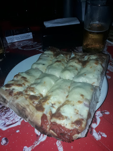 Pizzería Punto Uy - Gastronomía y hostelería