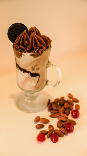 Comentarii opinii despre Heladería Artesanal y Cafetería Atlántida