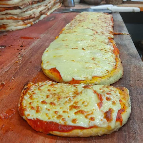 Pizzeria y Rotiseria Luigi's - Gastronomía y hostelería