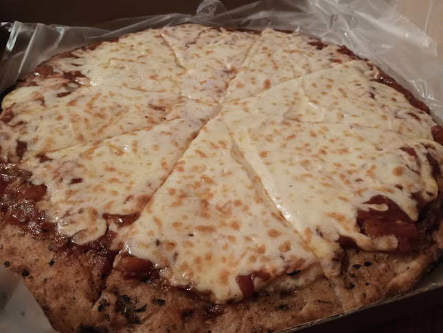 Pretto Pizzería - Gastronomía y hostelería