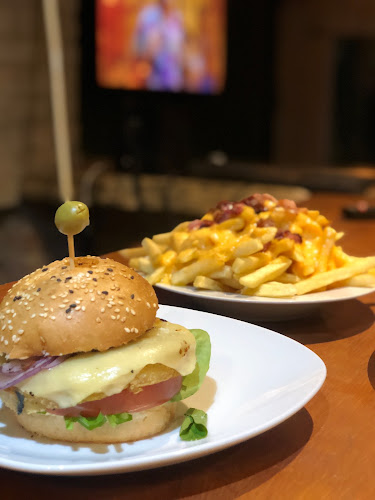 El Garage de George - La Paloma